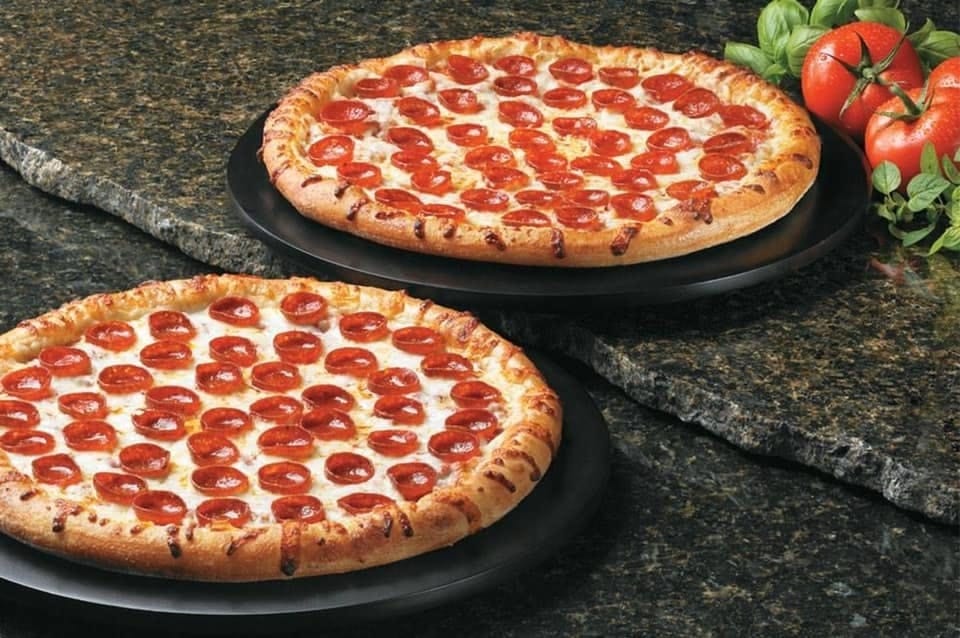 Two Large 14" One Topping Pizza & Half Gallon Tea Special.